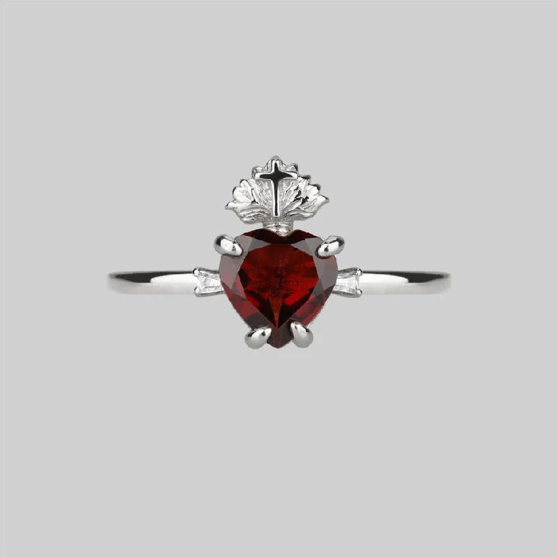 Chic Women's Rings for Fashion-Forward Looks-The Sacred Heart Garnet Ring - Silver