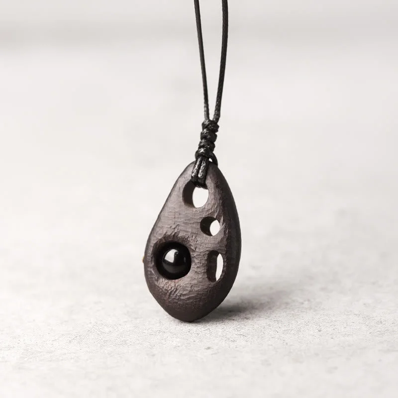 Shop Classic Women's Necklaces & Pendants with a Modern Twist-Buddha Stones Ebony Wood Hollow Inlaid Obsidian Peace Calm Necklace Pendant Shop Classic Women's Necklaces & Pendants with a Modern Twist-Buddha Stones Ebony Wood Hollow Inlaid Obsidian Peace Calm Necklace Pendant