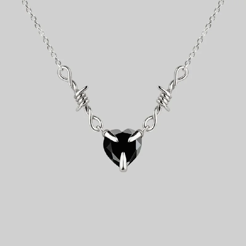 Shop Classic Women's  Necklaces & Pendants with a Modern Twist-FATAL. Barbed Wire & Black Onyx Heart Necklace - Silver