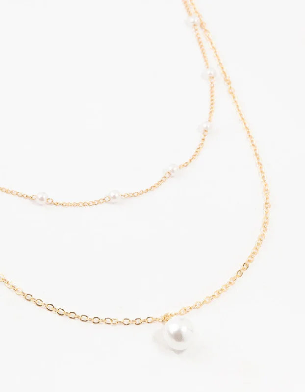 Shop Classic Women's Necklaces & Pendants with a Modern Twist-Gold Station Pearl Pendant Layered Necklace Shop Classic Women's Necklaces & Pendants with a Modern Twist-Gold Station Pearl Pendant Layered Necklace
