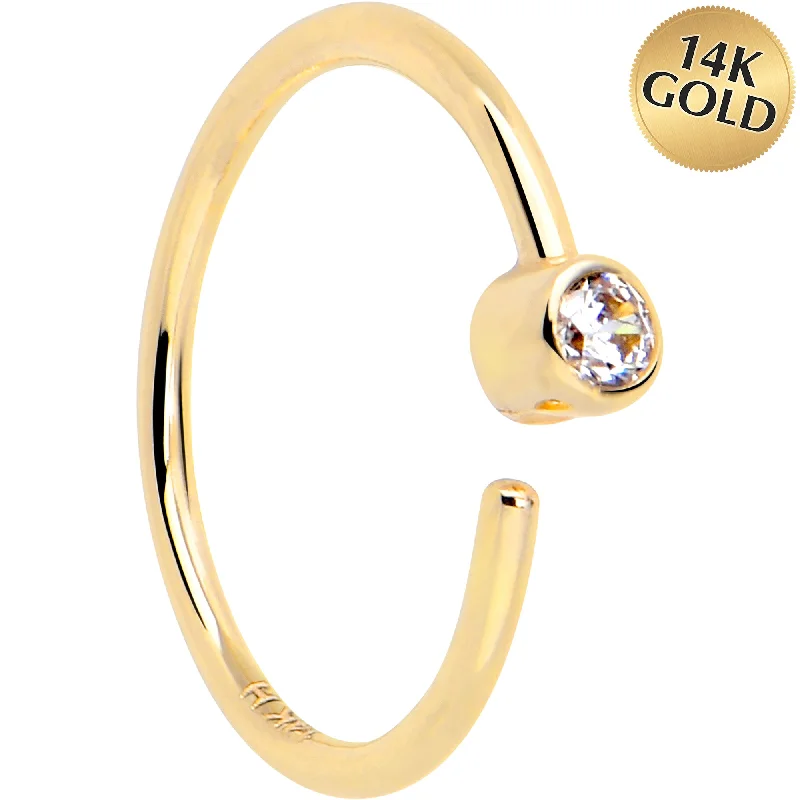 Comfortable Nose Rings with Simple Designs -14k Solid Yellow Gold Bendable Nose Hoop 22 Gauge 5/16 with Bezel CZ Comfortable Nose Rings with Simple Designs -14k Solid Yellow Gold Bendable Nose Hoop 22 Gauge 5/16 with Bezel CZ
