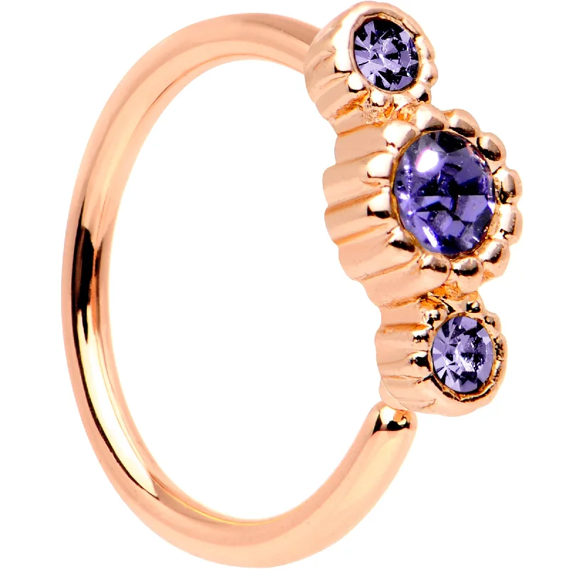 Simple Yet Elegant Nose Rings -20 Gauge Purple CZ Gem Rose Gold IP Triplet Seamless Circular Ring Simple Yet Elegant Nose Rings -20 Gauge Purple CZ Gem Rose Gold IP Triplet Seamless Circular Ring