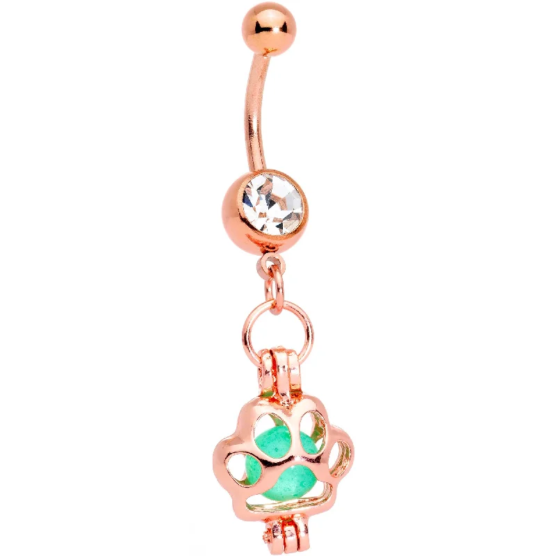 Comfortable Belly Rings for Fashionable Comfort -Clear Gem Rose Gold Tone Glow in the Dark Paw Print Dangle Belly Ring Comfortable Belly Rings for Fashionable Comfort -Clear Gem Rose Gold Tone Glow in the Dark Paw Print Dangle Belly Ring