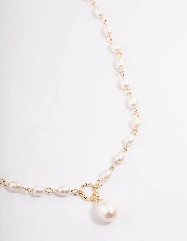 Shop Classic Women's Necklaces & Pendants with a Modern Twist-Gold Plated Freshwater Pearl Station Drop Necklace Shop Classic Women's Necklaces & Pendants with a Modern Twist-Gold Plated Freshwater Pearl Station Drop Necklace