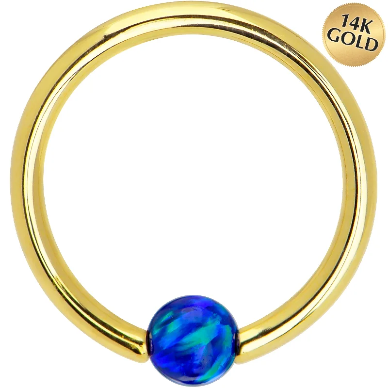 Lip Rings with Unique Accents14 Gauge 3/8 Solid 14KT Gold Dark Blue Synthetic Opal Captive Ring Lip Rings with Unique Accents14 Gauge 3/8 Solid 14KT Gold Dark Blue Synthetic Opal Captive Ring