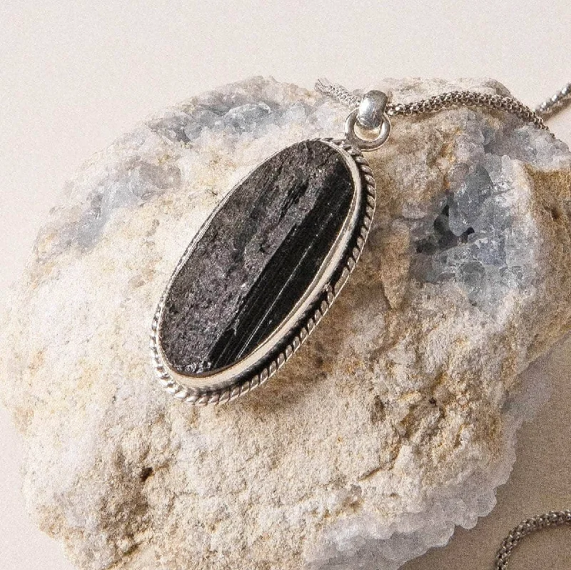 Exclusive Men's Necklaces & Pendants for the Modern Gentleman-Vintage Raw Black Tourmaline Oval Silver Pendant Exclusive Men's Necklaces & Pendants for the Modern Gentleman-Vintage Raw Black Tourmaline Oval Silver Pendant