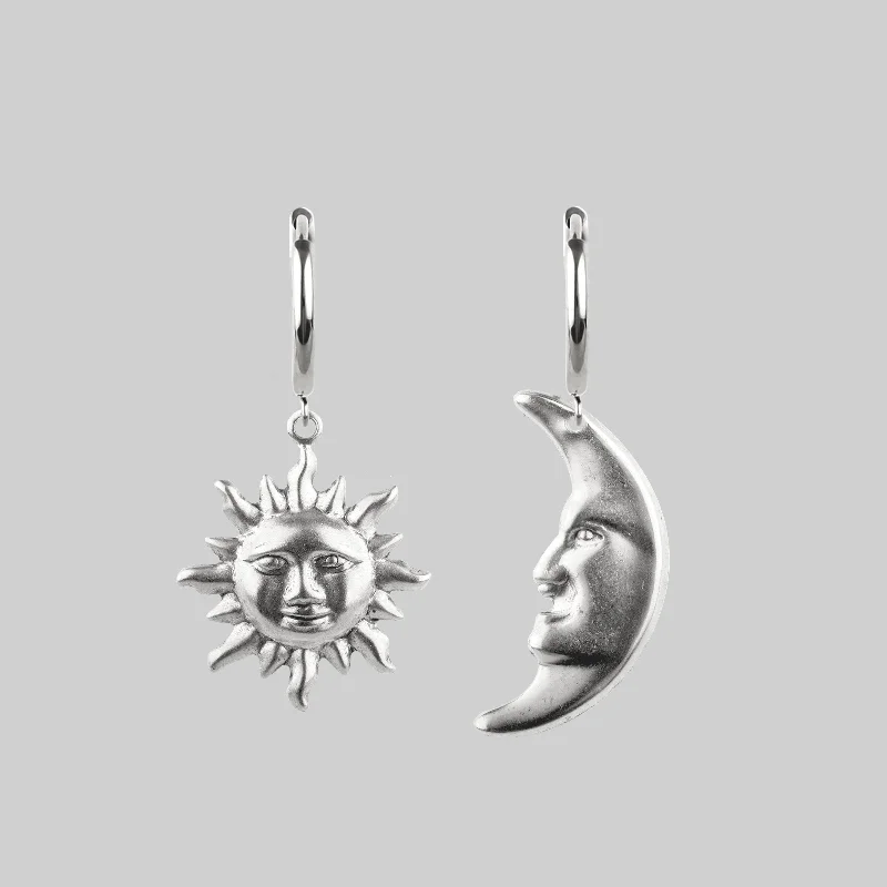 Women's Earrings – Elegant Designs for Every Personality--DAY TO NIGHT. Sun & Moon Hoop Earrings - Silver Women's Earrings – Elegant Designs for Every Personality--DAY TO NIGHT. Sun & Moon Hoop Earrings - Silver