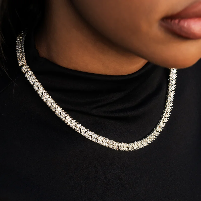 Shop Classic Women's Necklaces & Pendants with a Modern Twist-Iced Herringbone Necklace in Yellow Gold- 7mm Shop Classic Women's Necklaces & Pendants with a Modern Twist-Iced Herringbone Necklace in Yellow Gold- 7mm