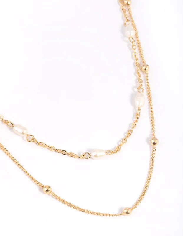 Shop Classic Women's Necklaces & Pendants with a Modern Twist-Gold Plated Freshwater Pearl Layered Necklace Shop Classic Women's Necklaces & Pendants with a Modern Twist-Gold Plated Freshwater Pearl Layered Necklace