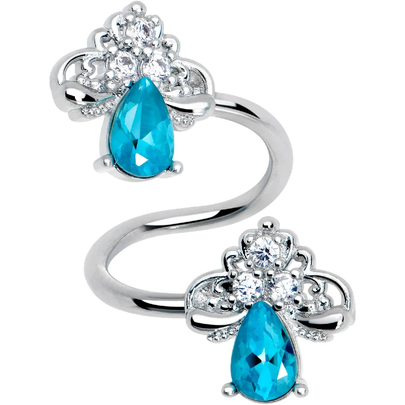 Designer Belly Rings for Bold Looks -Clear Blue Gem Style Simplicity Spiral Twister Belly Ring Designer Belly Rings for Bold Looks -Clear Blue Gem Style Simplicity Spiral Twister Belly Ring