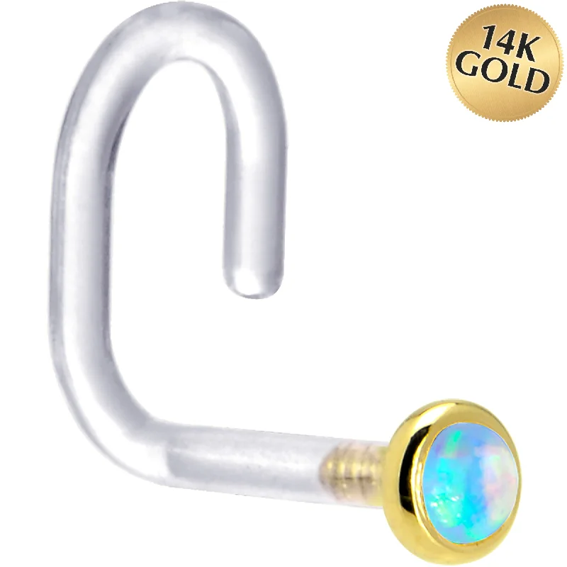 Nose Rings with Silver Finish -18 Gauge 1/4 Yellow Gold 2mm Light Blue Synthetic Opal Bioplast Nose Ring Nose Rings with Silver Finish -18 Gauge 1/4 Yellow Gold 2mm Light Blue Synthetic Opal Bioplast Nose Ring