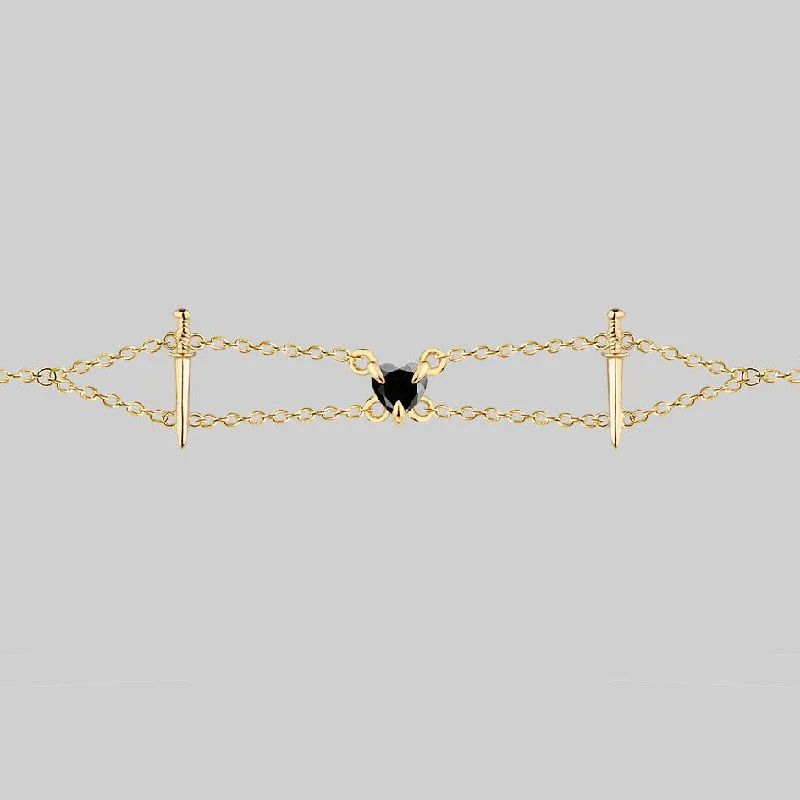 Shop Classic Women's Necklaces & Pendants with a Modern Twist-VINDICATE. Swords & Onyx Heart Choker - Gold Shop Classic Women's Necklaces & Pendants with a Modern Twist-VINDICATE. Swords & Onyx Heart Choker - Gold