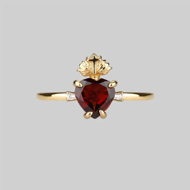 Chic Women's Rings for Fashion-Forward Looks-The Sacred Heart Garnet Ring - Gold