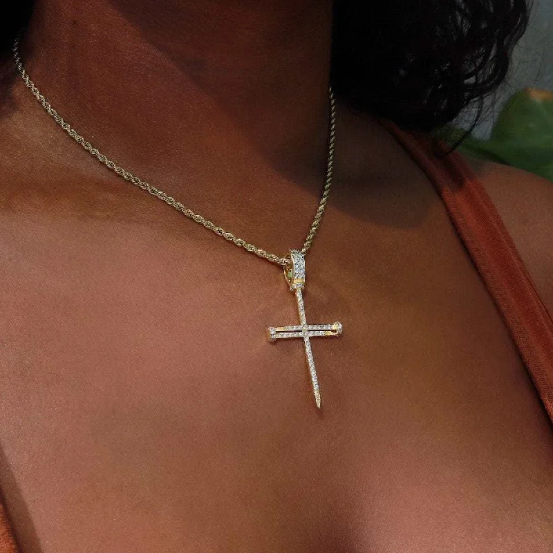 Shop Classic Women's Necklaces & Pendants with a Modern Twist-Nail Cross in Yellow Gold Shop Classic Women's Necklaces & Pendants with a Modern Twist-Nail Cross in Yellow Gold