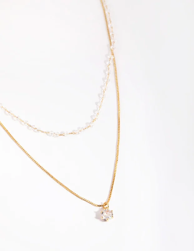 Shop Classic Women's Necklaces & Pendants with a Modern Twist-Gold Plated Necklace with Clear Stones Shop Classic Women's Necklaces & Pendants with a Modern Twist-Gold Plated Necklace with Clear Stones