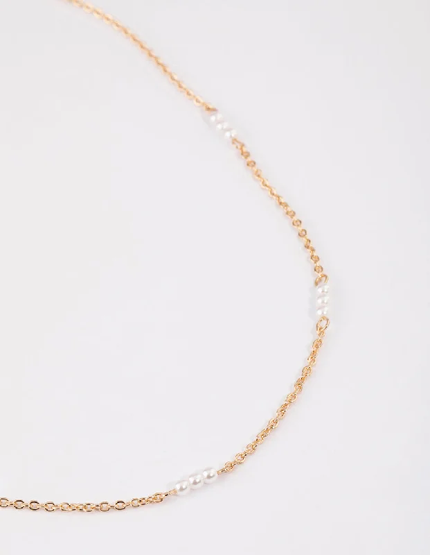 Shop Classic Women's Necklaces & Pendants with a Modern Twist-Gold Station Pearl Necklace Shop Classic Women's Necklaces & Pendants with a Modern Twist-Gold Station Pearl Necklace
