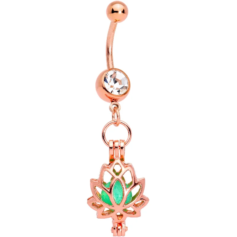 Belly Rings with Glowing Gemstones for Bold Style -Clear Gem Rose Gold Tone Glow in the Dark Lotus Flower Dangle Belly Ring Belly Rings with Glowing Gemstones for Bold Style -Clear Gem Rose Gold Tone Glow in the Dark Lotus Flower Dangle Belly Ring