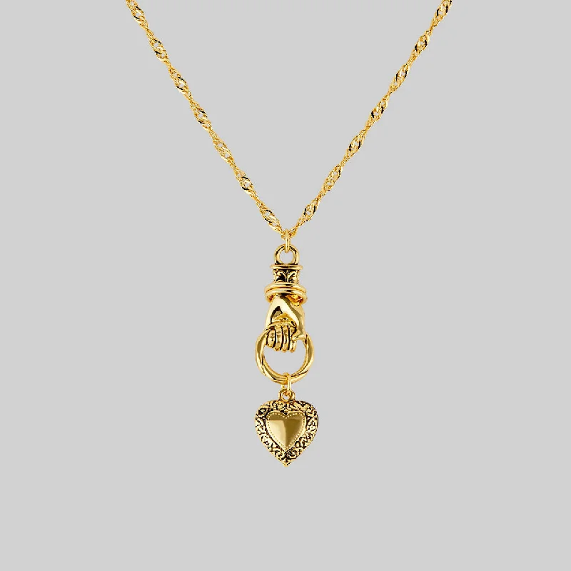 Shop Classic Women's Necklaces & Pendants with a Modern Twist-ALL OF ME. Hand Grasping Heart Necklace - Gold Shop Classic Women's Necklaces & Pendants with a Modern Twist-ALL OF ME. Hand Grasping Heart Necklace - Gold