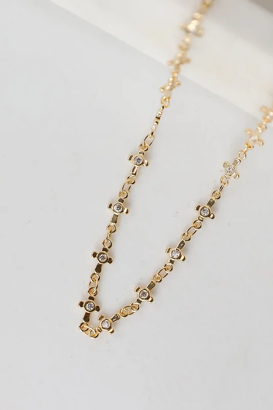 Shop Classic Women's Necklaces & Pendants with a Modern Twist-Caroline Gold Rhinestone Cross Chain Necklace Shop Classic Women's Necklaces & Pendants with a Modern Twist-Caroline Gold Rhinestone Cross Chain Necklace