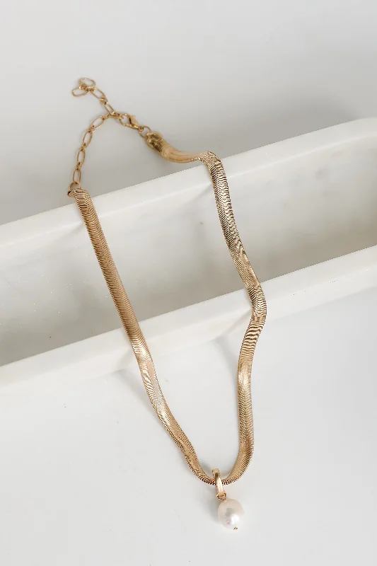 Shop Classic Women's Necklaces & Pendants with a Modern Twist-Reagan Gold Snake Chain Pearl Charm Necklace Shop Classic Women's Necklaces & Pendants with a Modern Twist-Reagan Gold Snake Chain Pearl Charm Necklace